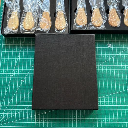 5 sets of boxed cheese knives