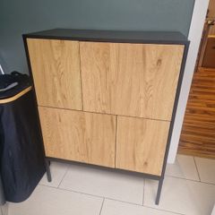 Modern black and oak-effect storage cabinet
