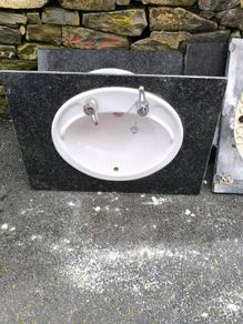 Bathroom, toilets & sinks with marble tops