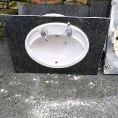 Bathroom, toilets & sinks with marble tops