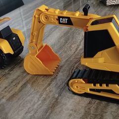 2 Caterpillar Toy Trucks