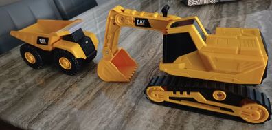 2 Caterpillar Toy Trucks