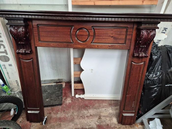 wooden mantel and marble base