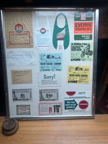 Old shop advertising / coupons framed