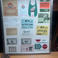Old shop advertising / coupons framed
