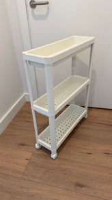 white rolling trolley