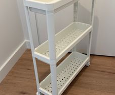 white rolling trolley