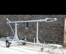 A 30-ft wind-up/tilt-over trailer mast
