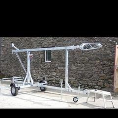 A 30-ft wind-up/tilt-over trailer mast