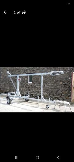A 30-ft wind-up/tilt-over trailer mast