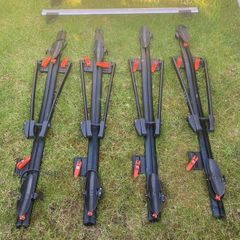 Roof bars and roof mounted bike rack carriers