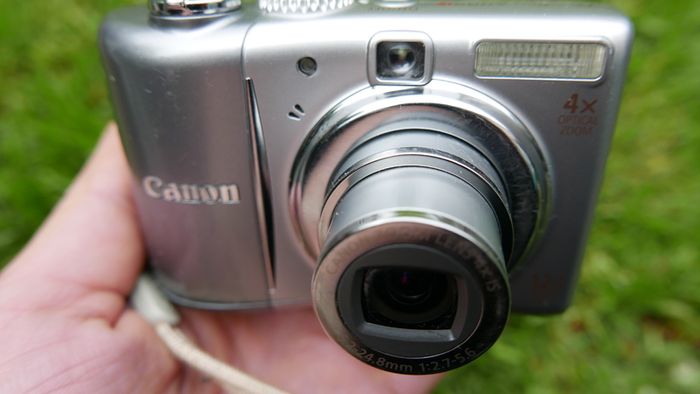 Canon PowerShot A1100 IS 12.1MP Digital Camera - Silver Tested Works well
