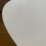 Oval white coffee table with wooden legs Image 3