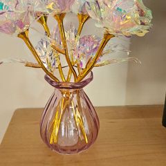 6 small roses in pink vase