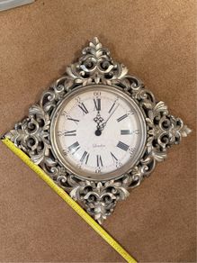 Ornate gold wall clock