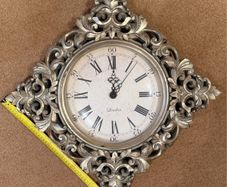 Ornate gold wall clock