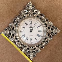 Ornate gold wall clock