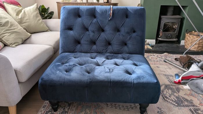 Navy footstool/ottoman from Next. Good condition. Material has rip so needs repair or reupholstery.