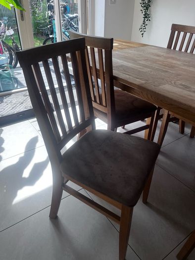 Solid oak dining table and chairs