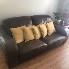 Brown leather sofa.