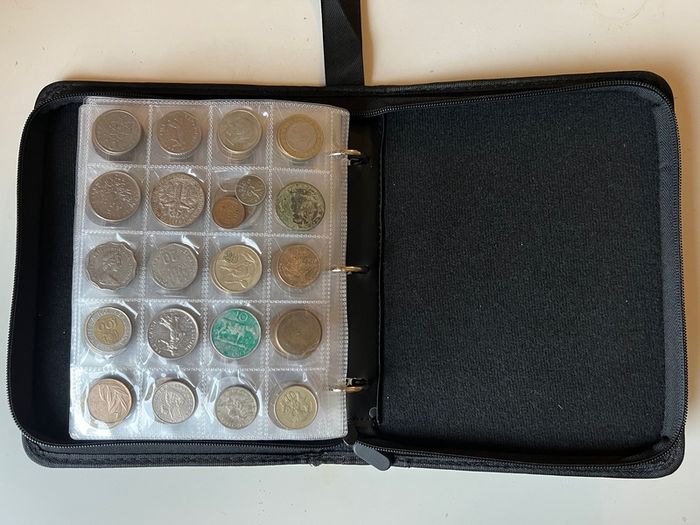 Coins collection foreign unknown 300 coins in album