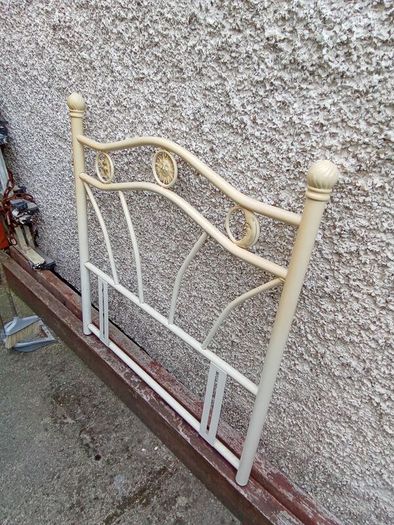 Metal single bed head frame.