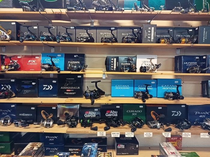 Fishing bait rods lines reels waders lures feeds jackets rod holders and other fishing gear
