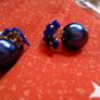Purple flower earring with back pearl earring stopper Image 2