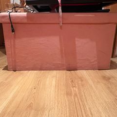 Pink storage pouffe