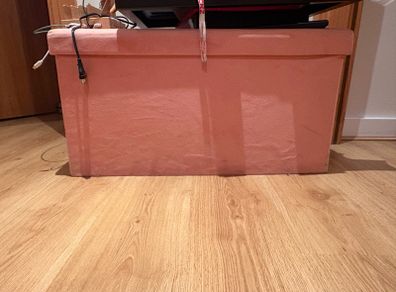 Pink storage pouffe