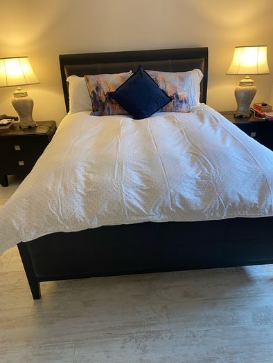 king size bed with matching lockers and lamps
