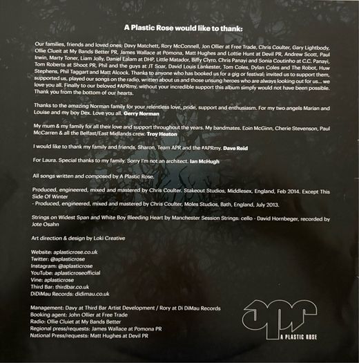 Autographed copy. A Plastic Rose - Flickering Light of an Inner War. Northern Ireland rock band. Limited edition - translucent red and blue vinyl. Like new. Bargain!