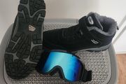 Men ski boots and glasses