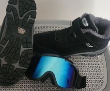 Men ski boots and glasses