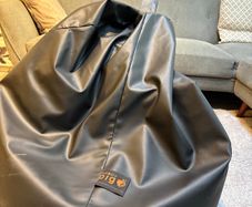 Black faux leather beanbag