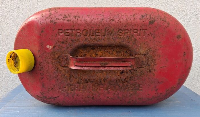 Vintage metal 1950s petroleum 2 gallon can