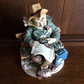 Capodimonte Style Man on Bench Ornament