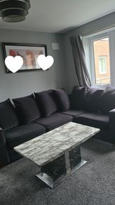 4-seater black corner sofa