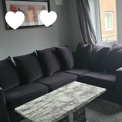 4-seater black corner sofa