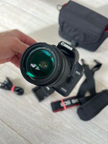 Canon EOS 1000D DSLR camera with Canon EF-S 18-55mm f/3.5-5.6 II lens.