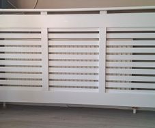 Large modern white radiator cover