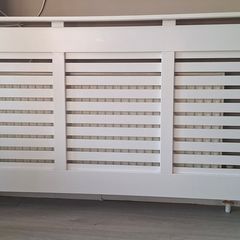 Large modern white radiator cover