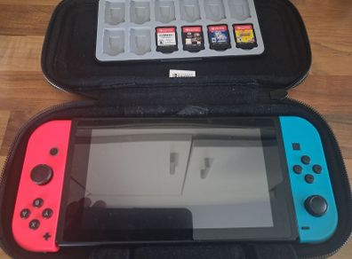 Nintendo switch + 4 games and case