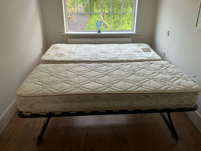 Single bed with pullout bed underneath