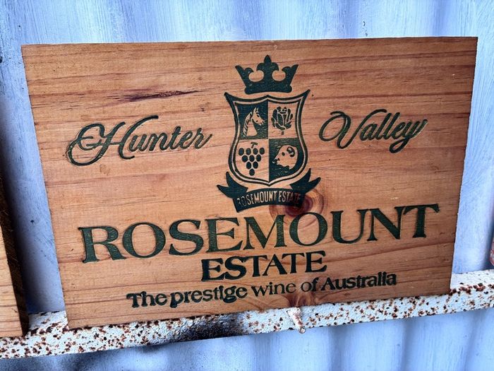 Matching pair of wooden wine plaques