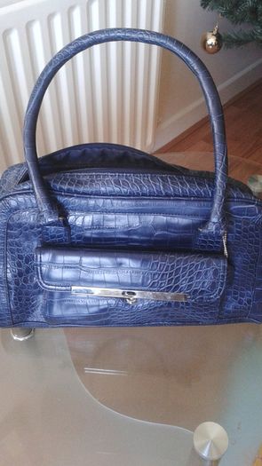 Brand new purple "clark" handbag