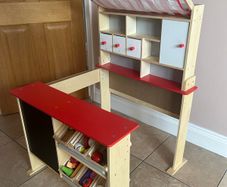 Children's wooden kitchen with chalk board