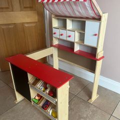 Children's wooden kitchen with chalk board