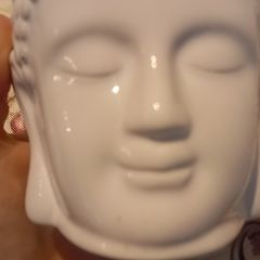 Buddha oil burner