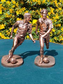 Two Gilded footballers